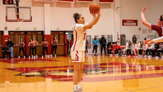 Photo of BU women's basketball sophomore Rose Azmoudeh shooting a three-pointer at Case Gym.