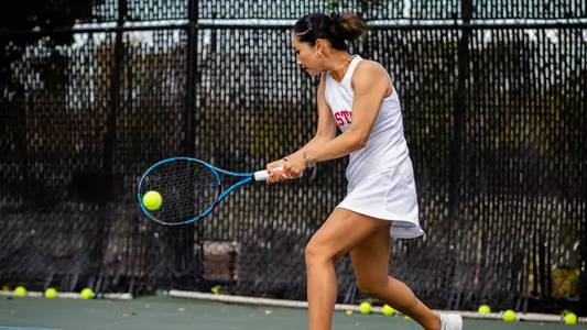 Emily Zhao hits a backhand shot