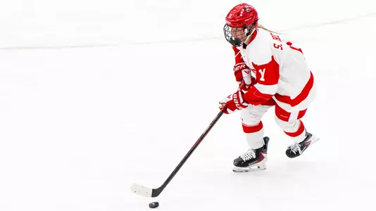 Syndey Healey playing hockey at Walter Brown Arena