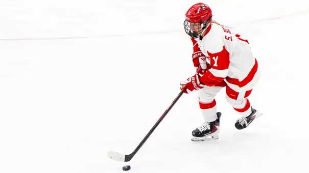 Syndey Healey playing hockey at Walter Brown Arena