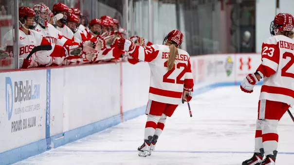 Lexie Bertelsen high fives the bench after scoring a goal at Walter Brown Arena