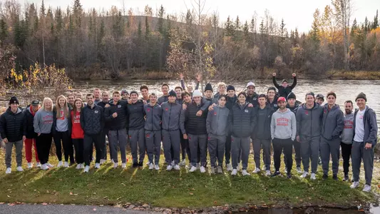 BU men's ice hockey team poses for a group photo in Fairbanks, Alaska
