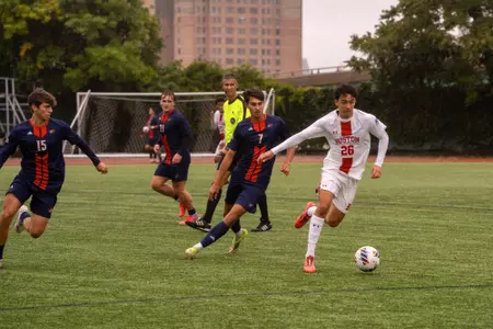 Jason Zacarias plays soccer against Bucknell