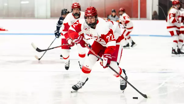 Bronwyn Langis playing hockey at Walter Brown Arena