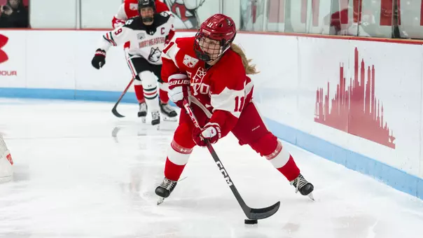 Lexie Bertelsen playing hockey vs Northeastern 2026