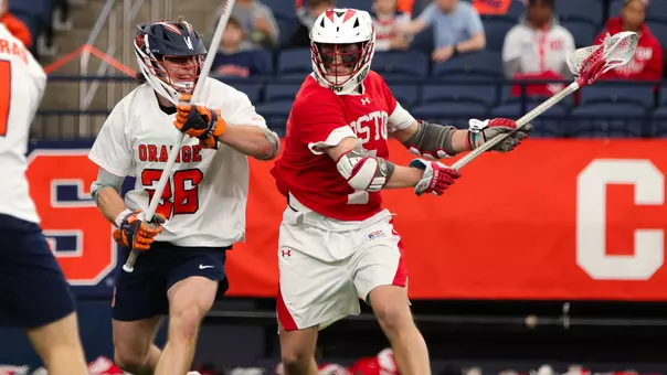 Timothy Shannehan playing lacrosse against Syracuse