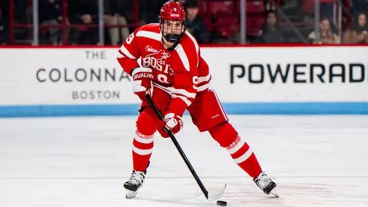 Sacha Boisvert skating the the puck