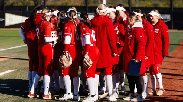 BU softball team huddles together at the UCF Black & Gold Classic