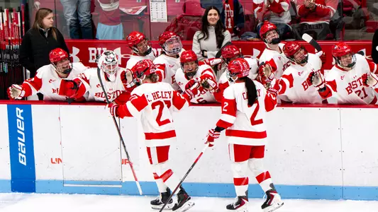women's ice hockey bench high fives goal