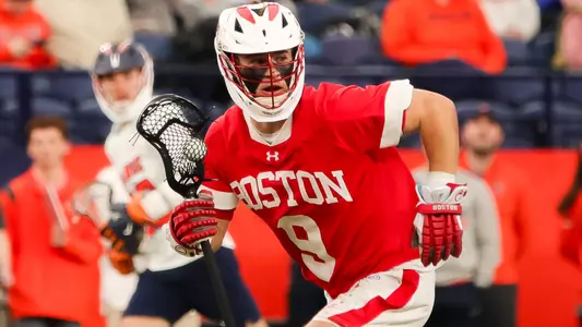 Luke Davis playing lacrosse