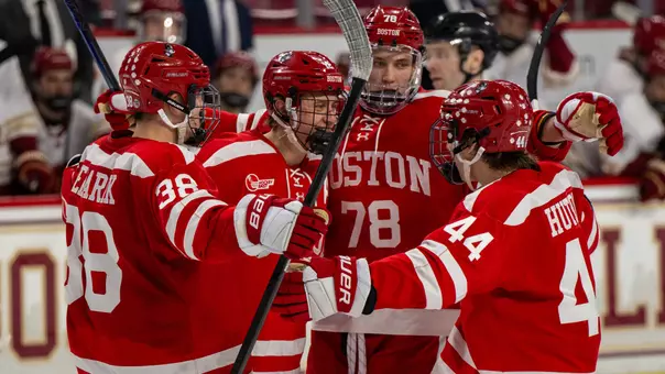 BU men's hockey players celebrate a goal at BC