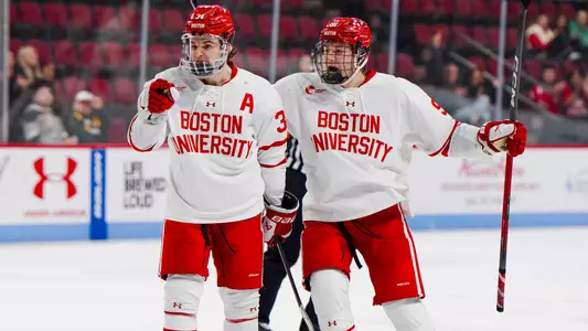 Cole Eiserman and Charlie Trethewey celebrate a goal