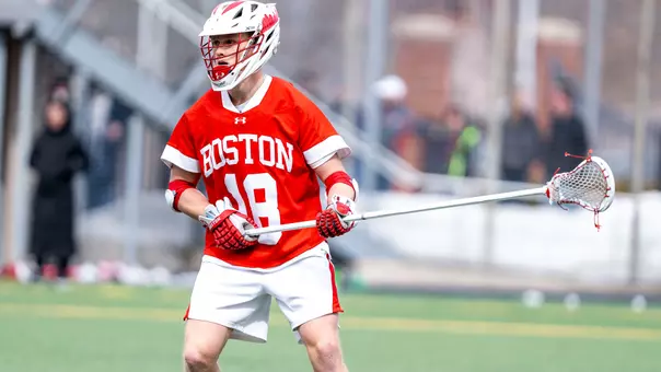 Logan Styles playing lacrosse