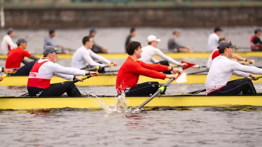 Photo of multiple BU Men's Rowing crews racing on the Charles River.