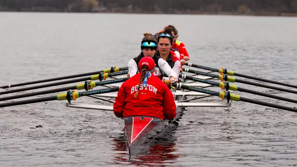 Women's rowing 2V8 on the Charles River for practice