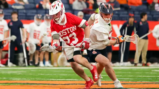Madden Murphy winning a faceoff at Syracuse