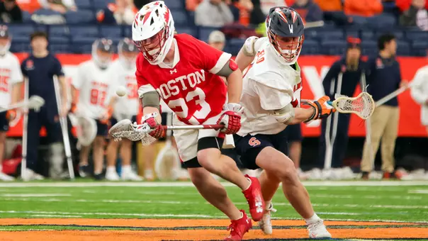 Madden Murphy winning a faceoff at Syracuse