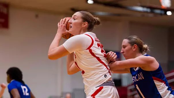 Photo of BU women's basketball senior Anete Adler holding the ball at Case Gym.