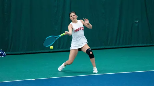 Ellie Gyuro playing tennis at Bucknell