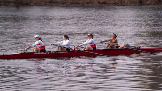 Photo of the BU Lightweight Rowing Four on the Charles River.