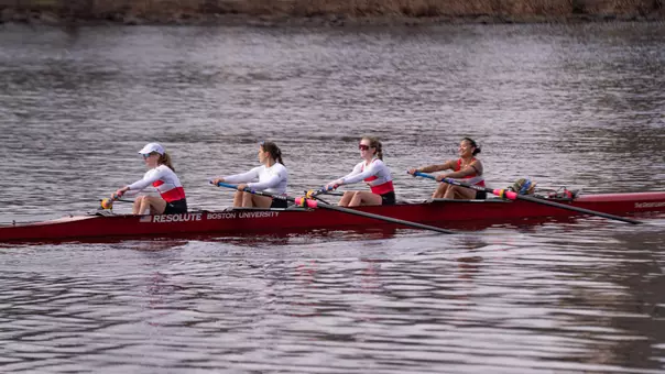 Photo of the BU Lightweight Rowing Four on the Charles River.