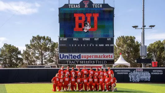 BU softball team poses for group photo at Texas Tech