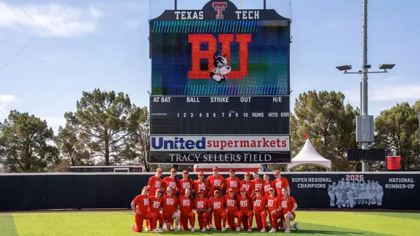BU softball team poses for group photo at Texas Tech
