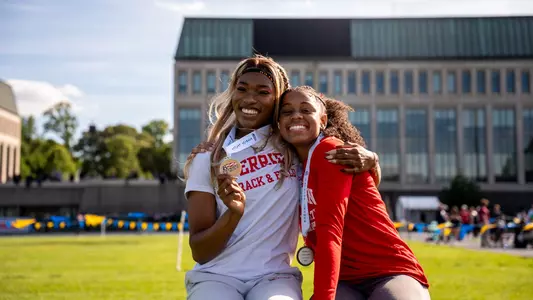 Peace Omonzane and Jada Smith with Medals