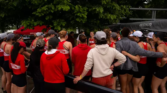 Women's rowing post race huddle
