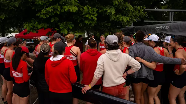 Women's rowing post race huddle
