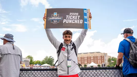 Owen Faulha Holding Ticket Punched Sign