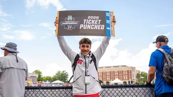 Owen Faulha Holding Ticket Punched Sign