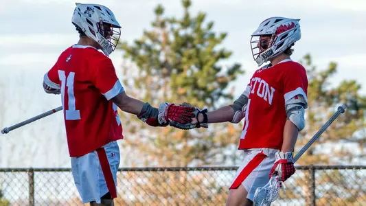 Tyler Fox and Timothy Shannehan celebrate a goal together
