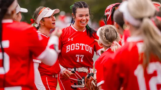 Kasey Ricard smiling with her teammates