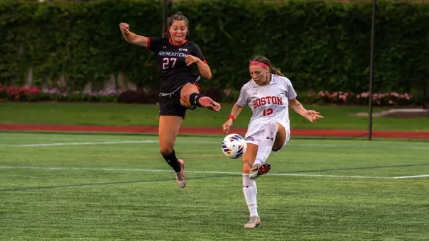Women's soccer playing soccer against Northeastern at home