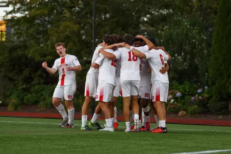 Men's soccer celebrating Andrea's goal against Army