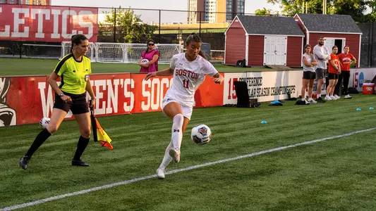 Photo of BU women's soccer sophomore Nina Tzouganatos settling a ball at Nickerson Field.