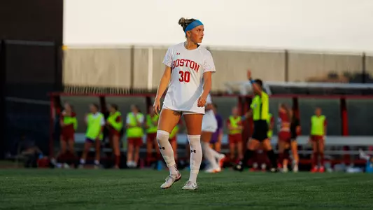 Photo of BU women's soccer junior Olivia Avellar looking up during a game at Nickerson Field.