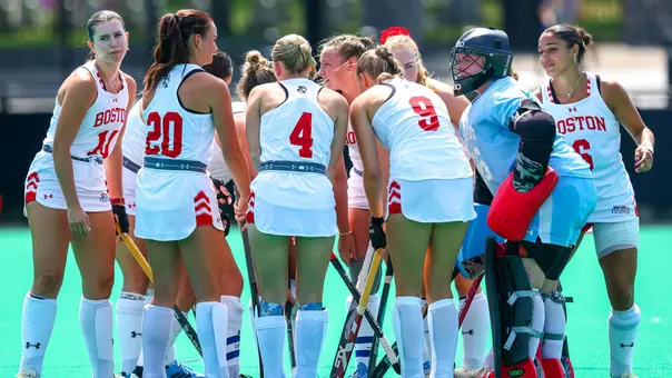 Field hockey huddle at Providence