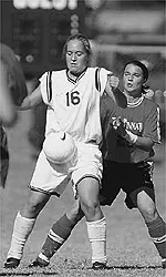 Candice Spiniolas and the<br>Lady Tigers play their last<br>three regular-season<br>games on the road.