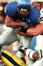Gerard Arnold ran for<br>a touchdown in the<br>first half against Army.
