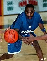 Southern Mississippi forward Carl Henderson and Memphis guard Marcus Moody fight for a loose ball in the first half Saturday.