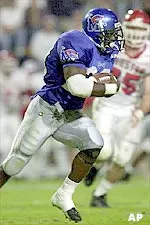 Sugar Sanders heads for the open field during Saturday's game.