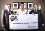 University of Memphis basketball coach John Calipari (center) and Pace Cooper (right), owner of Cal's Championship Steaks, present a check for $40,000 to the University of Memphis. Accepting the check on behalf of the University is interim U of M president Dr. Ralph Faudree.