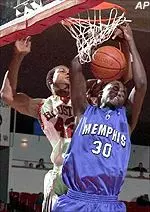 Memphis' Earl Barron is fouled by Houston's George WIlliams as he goes up for a dunk in the first half of Wednesday's game.
