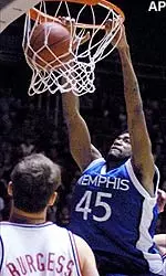 Kelly Wise throws down two of his 13 points Tuesday night in Salt Lake City.