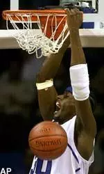 Earl Barron dunks the ball during first-half action against UAB.