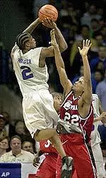 Dajuan Wagner shoots over Reece Gaines during the second half.