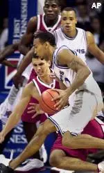 John Grice drives past Austin Peay's Rhet Wierzba during the second half.