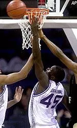 Forward Duane Erwin attempts to block a shot during the first half.